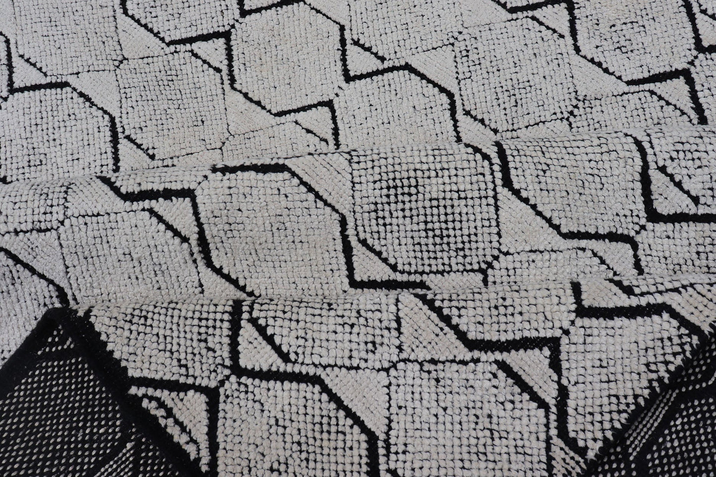 All - Over Geometric Modern Large Rug in Ivory and Black Measures 9'0 x 12'0 This modern rug features a field of a ivory with a simple geometric design lined by black. The design is a minimalistic, repeating pattern of octagons panelin... - Keivan Woven ArtsIN - ILM - 161 - MK - 6335 - 20982Rug