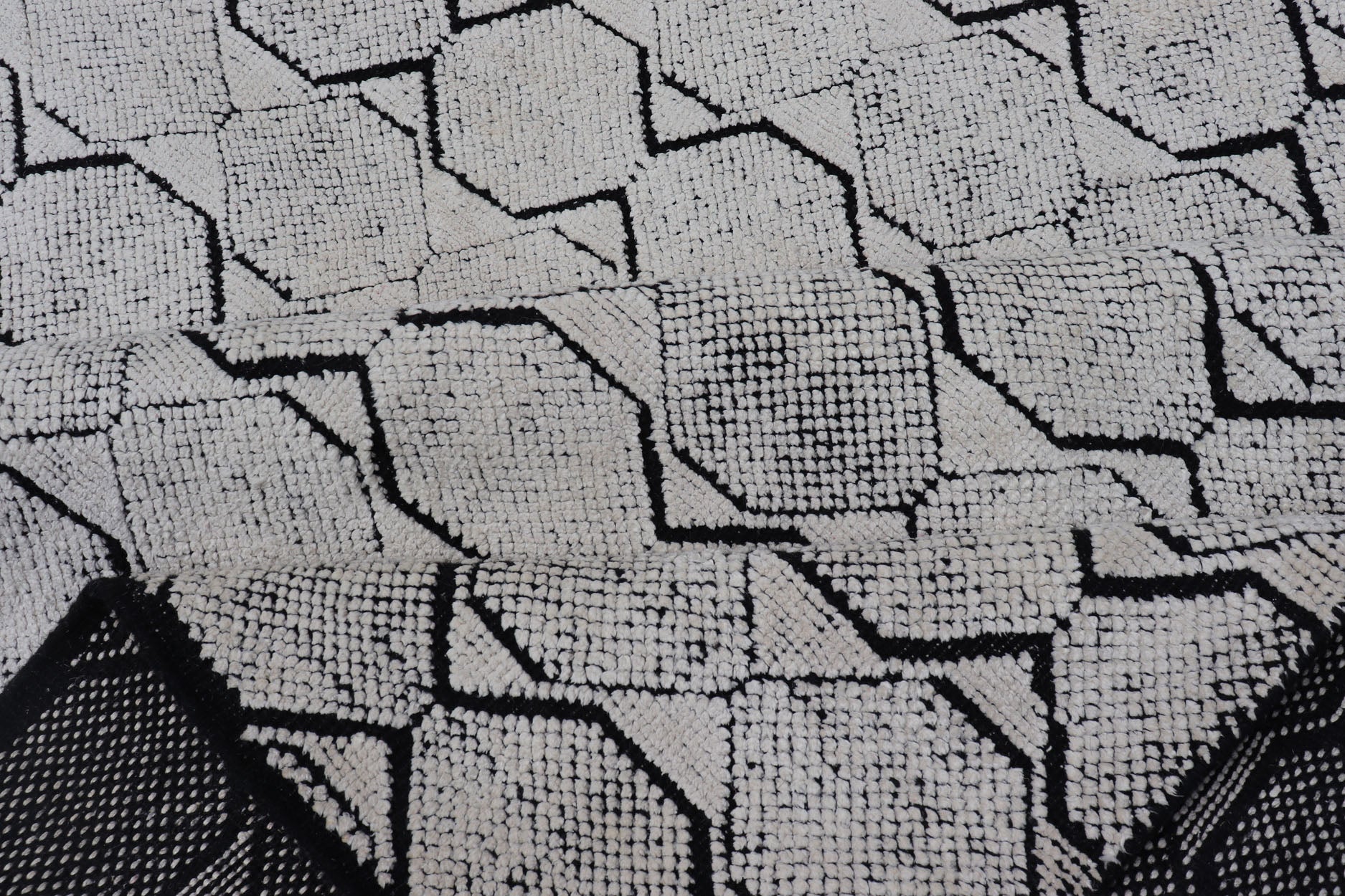 All - Over Geometric Modern Large Rug in Ivory and Black Measures 9'0 x 12'0 This modern rug features a field of a ivory with a simple geometric design lined by black. The design is a minimalistic, repeating pattern of octagons panelin... - Keivan Woven ArtsIN - ILM - 161 - MK - 6335 - 20982Rug