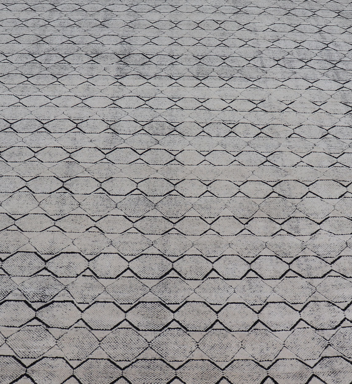 All - Over Geometric Modern Large Rug in Ivory and Black Measures 9'0 x 12'0 This modern rug features a field of a ivory with a simple geometric design lined by black. The design is a minimalistic, repeating pattern of octagons panelin... - Keivan Woven ArtsIN - ILM - 161 - MK - 6335 - 20982Rug