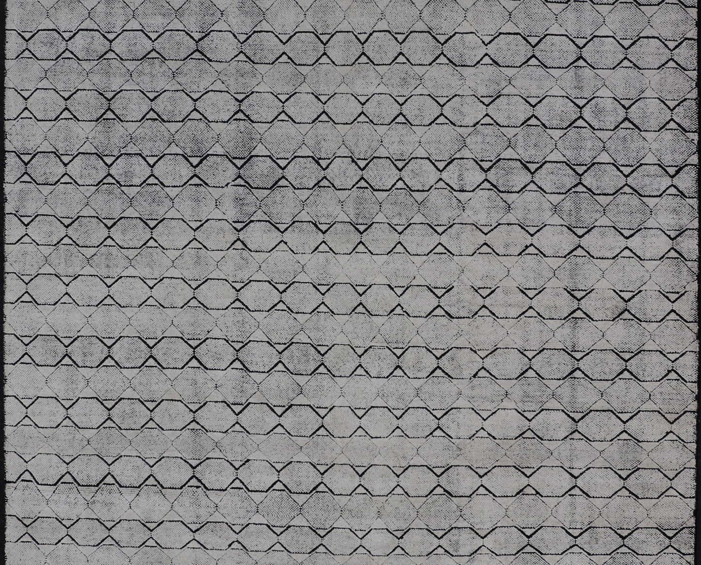 All - Over Geometric Modern Large Rug in Ivory and Black Measures 9'0 x 12'0 This modern rug features a field of a ivory with a simple geometric design lined by black. The design is a minimalistic, repeating pattern of octagons panelin... - Keivan Woven ArtsIN - ILM - 161 - MK - 6335 - 20982Rug
