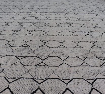 All - Over Geometric Modern Large Rug in Ivory and Black Measures 9'0 x 12'0 This modern rug features a field of a ivory with a simple geometric design lined by black. The design is a minimalistic, repeating pattern of octagons panelin... - Keivan Woven ArtsIN - ILM - 161 - MK - 6335 - 20982Rug