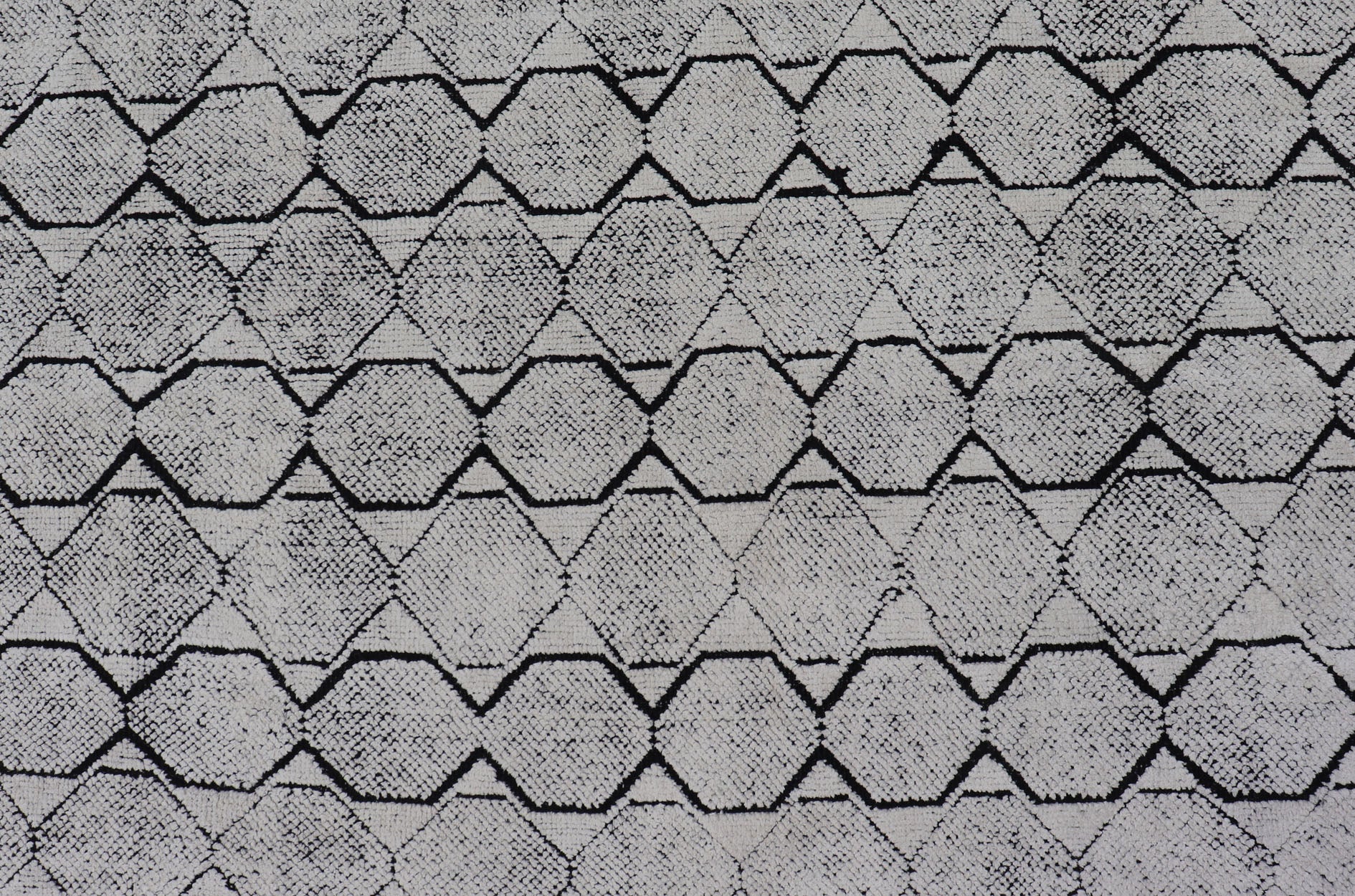 All - Over Geometric Modern Large Rug in Ivory and Black Measures 9'0 x 12'0 This modern rug features a field of a ivory with a simple geometric design lined by black. The design is a minimalistic, repeating pattern of octagons panelin... - Keivan Woven ArtsIN - ILM - 161 - MK - 6335 - 20982Rug
