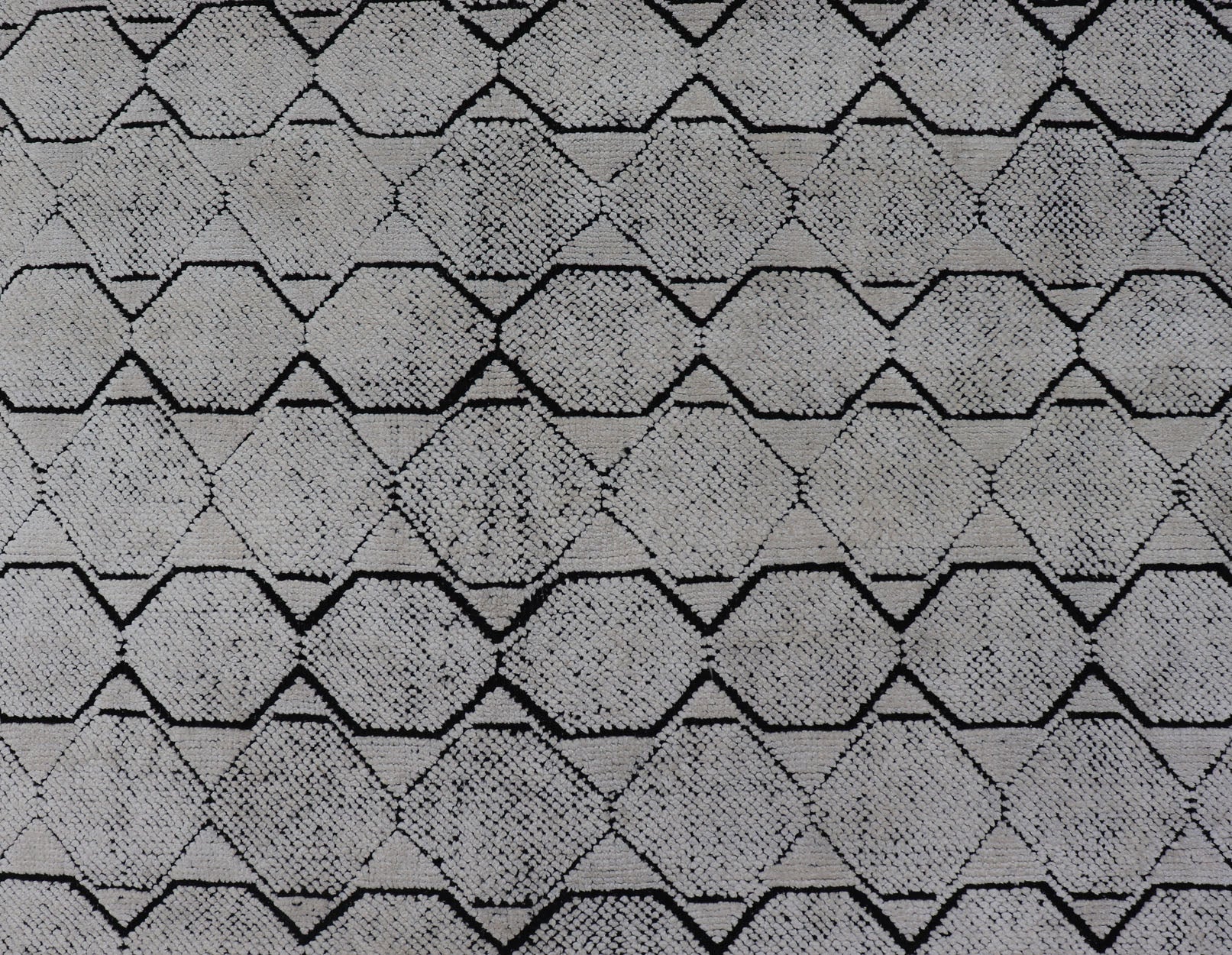 Indian Modern Geometric & Minimal Design Area Rug in Ivory and Black Measures 6'1 x 9'2 The design is a minimalistic, repeating pattern of octagons and triangles in black and ivory paneling the entire face horizontally. With a less - is - m... - Keivan Woven ArtsIN - ILM - 162 - 20988Rug