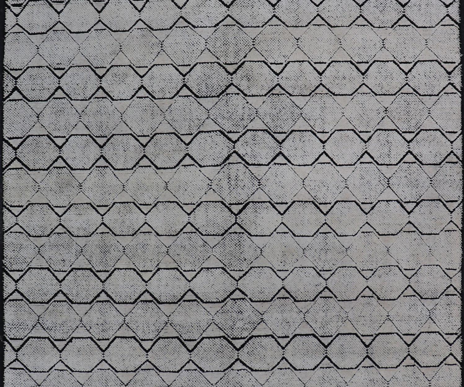 Indian Modern Geometric & Minimal Design Area Rug in Ivory and Black Measures 6'1 x 9'2 The design is a minimalistic, repeating pattern of octagons and triangles in black and ivory paneling the entire face horizontally. With a less - is - m... - Keivan Woven ArtsIN - ILM - 162 - 20988Rug