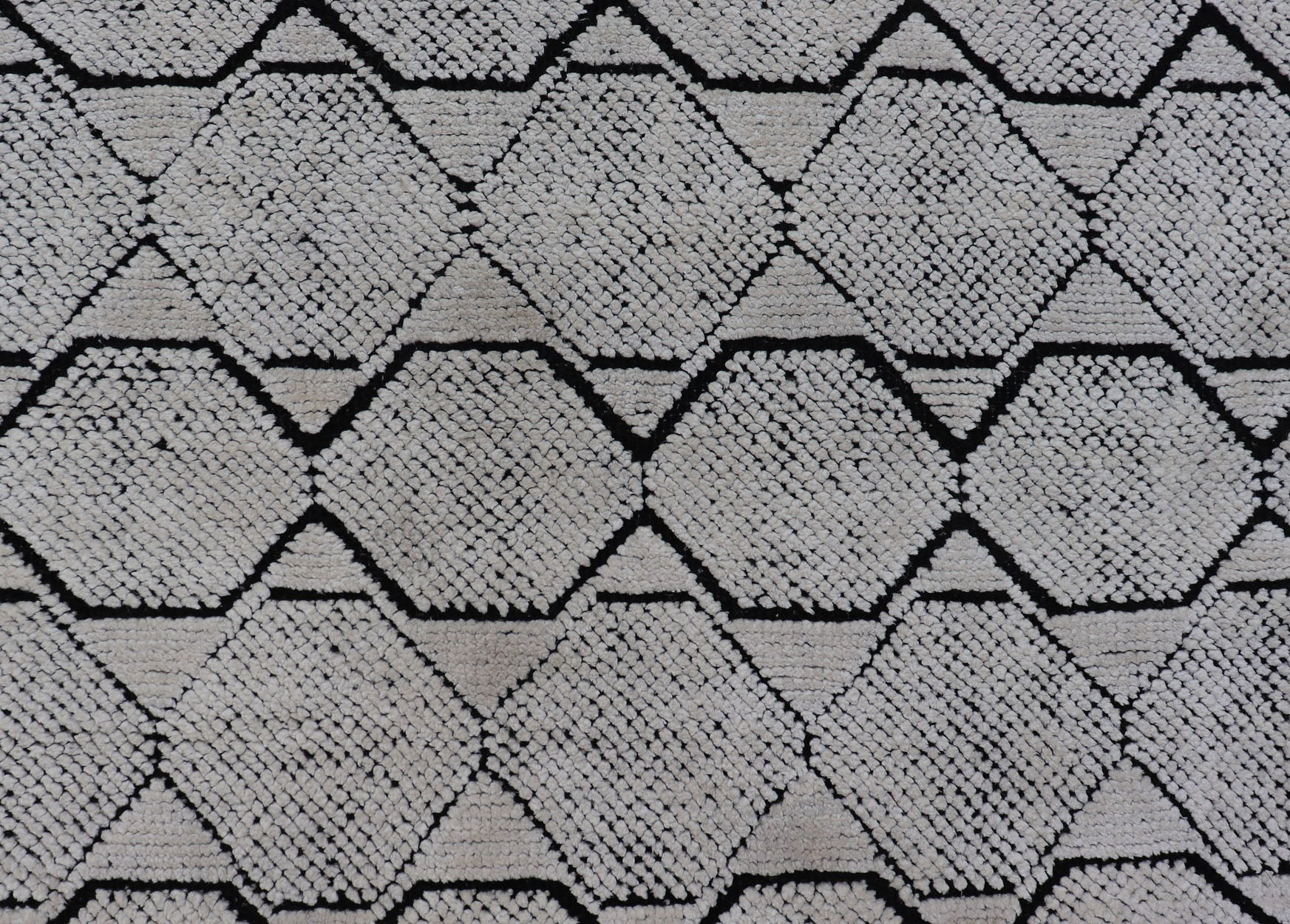 Indian Modern Geometric & Minimal Design Area Rug in Ivory and Black Measures 6'1 x 9'2 The design is a minimalistic, repeating pattern of octagons and triangles in black and ivory paneling the entire face horizontally. With a less - is - m... - Keivan Woven ArtsIN - ILM - 162 - 20988Rug
