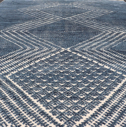 Modern Indian Area Rug with Tribal Design in Denim Blue and Ivory Measures 6'0 x 8'11 This elegant piece features a classic tribal stylization of vertical diamond medallions with a minimal twist. The medallions have a more modern de... - Keivan Woven ArtsIN - ILM - 165 - CB - 4018 - 20922