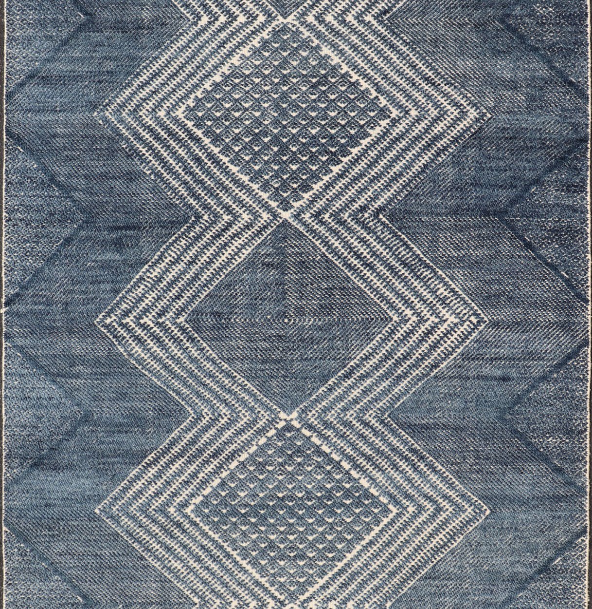 Modern Indian Area Rug with Tribal Design in Denim Blue and Ivory Measures 6'0 x 8'11 This elegant piece features a classic tribal stylization of vertical diamond medallions with a minimal twist. The medallions have a more modern de... - Keivan Woven ArtsIN - ILM - 165 - CB - 4018 - 20922Rug