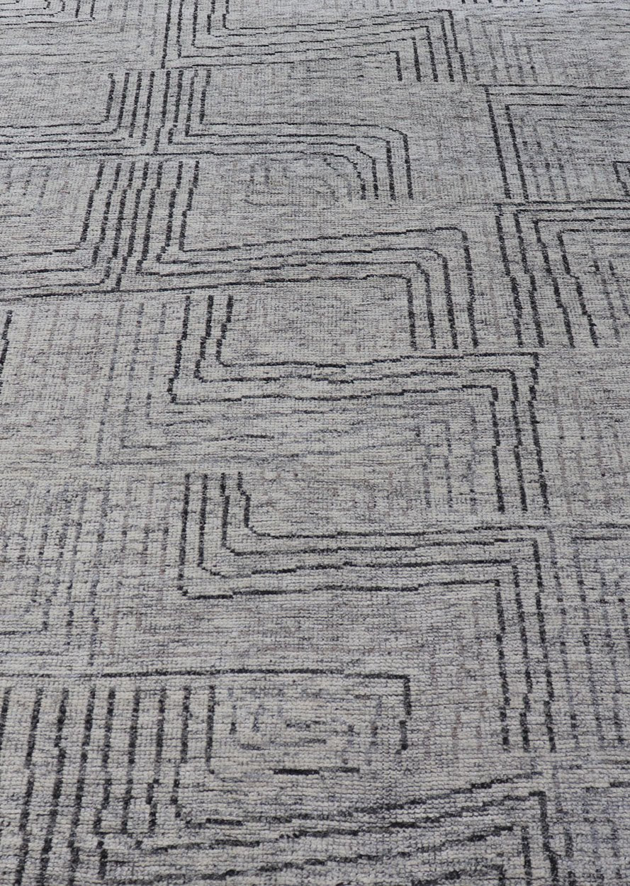 Indian Modern Hand Knotted Design With All Neutral Colored Wool Area Rug Measures 6 x 8'8 This modern area rug features varying shades of gray in the field, blending neutrals into a near - homogenous color. The simple design vines all - ove... - Keivan Woven ArtsIN - ILM - 167 - VT - 516 - 21096