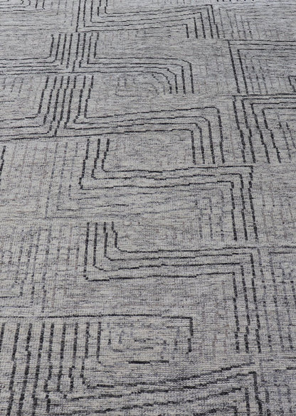 Indian Modern Hand Knotted Design With All Neutral Colored Wool Area Rug Measures 6 x 8'8 This modern area rug features varying shades of gray in the field, blending neutrals into a near - homogenous color. The simple design vines all - ove... - Keivan Woven ArtsIN - ILM - 167 - VT - 516 - 21096