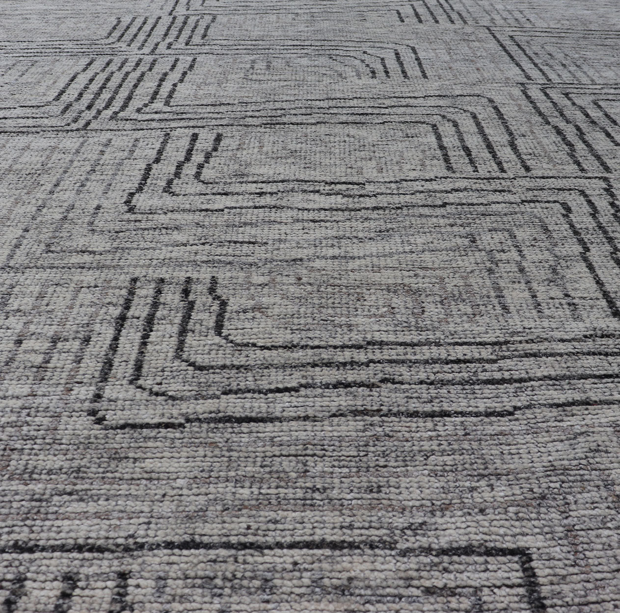 Indian Modern Hand Knotted Design With All Neutral Colored Wool Area Rug Measures 6 x 8'8 This modern area rug features varying shades of gray in the field, blending neutrals into a near - homogenous color. The simple design vines all - ove... - Keivan Woven ArtsIN - ILM - 167 - VT - 516 - 21096
