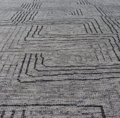 Indian Modern Hand Knotted Design With All Neutral Colored Wool Area Rug Measures 6 x 8'8 This modern area rug features varying shades of gray in the field, blending neutrals into a near - homogenous color. The simple design vines all - ove... - Keivan Woven ArtsIN - ILM - 167 - VT - 516 - 21096