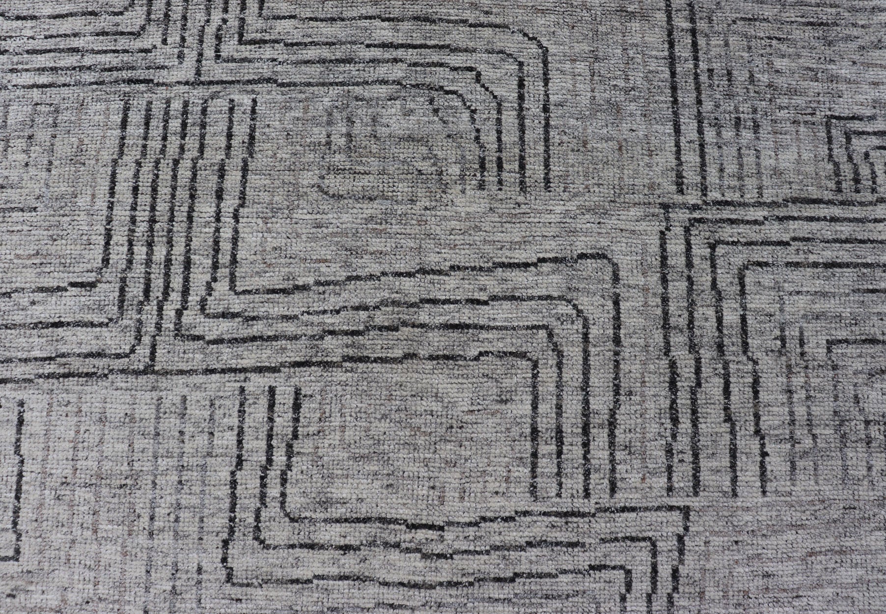 Indian Modern Hand Knotted Design With All Neutral Colored Wool Area Rug Measures 6 x 8'8 This modern area rug features varying shades of gray in the field, blending neutrals into a near - homogenous color. The simple design vines all - ove... - Keivan Woven ArtsIN - ILM - 167 - VT - 516 - 21096Rug