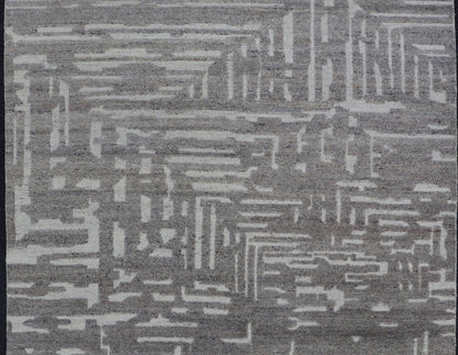 Modern Hand Knotted Wool Area Rug in Cream and Light Gray With Abstract Design Measures 5'8 x 8'5 This modern area rug was hand - knotted in during the 2020's. The field features a sub - geometric abstract design cover the entirety of the fa... - Keivan Woven ArtsIN - ILM - 172 - HW - 2330 - 21006Rug