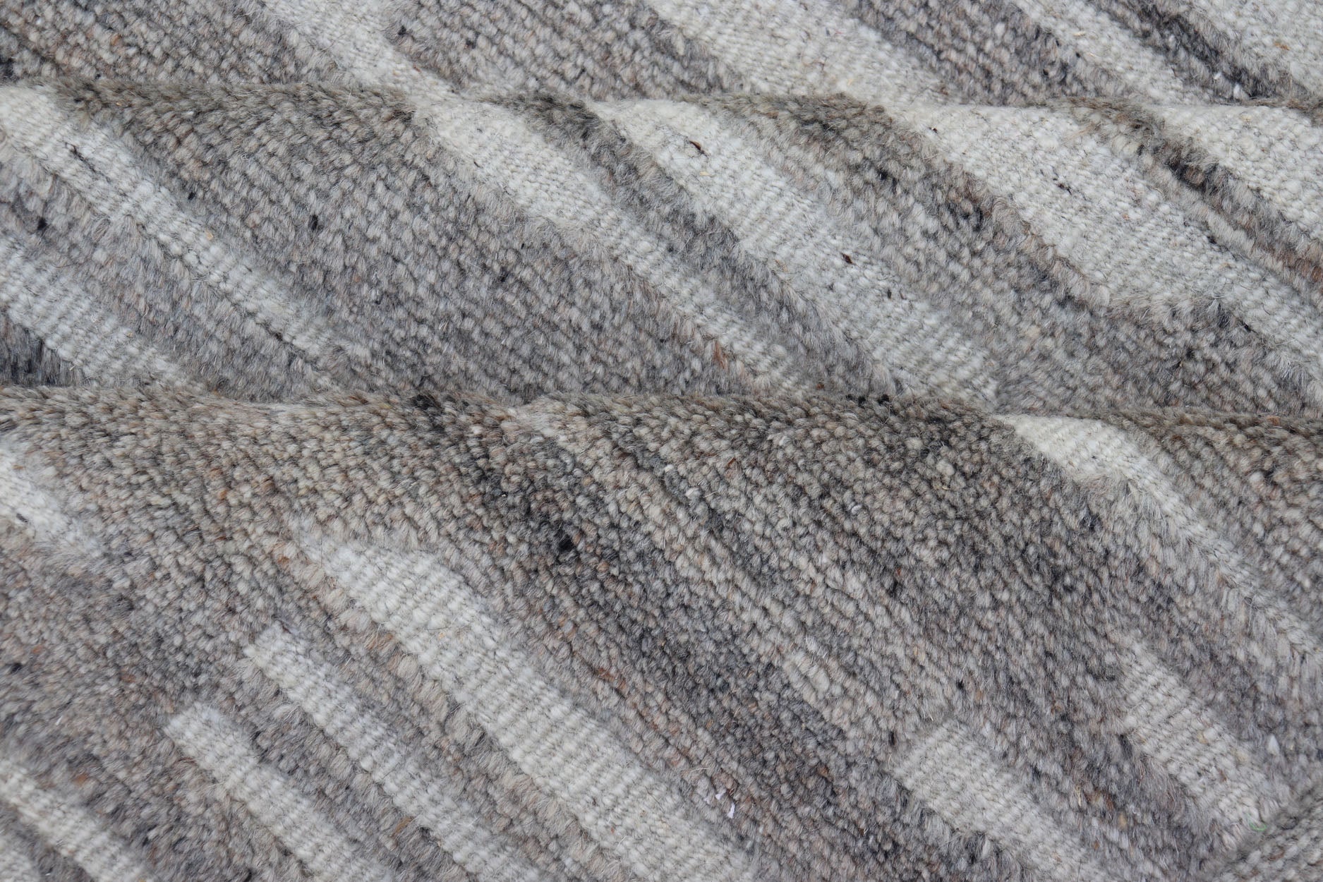 Modern Hand Knotted Wool Area Rug in Cream and Light Gray With Abstract Design Measures 5'8 x 8'5 This modern area rug was hand - knotted in during the 2020's. The field features a sub - geometric abstract design cover the entirety of the fa... - Keivan Woven ArtsIN - ILM - 172 - HW - 2330 - 21006Rug