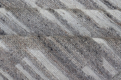Modern Hand Knotted Wool Area Rug in Cream and Light Gray With Abstract Design Measures 5'8 x 8'5 This modern area rug was hand - knotted in during the 2020's. The field features a sub - geometric abstract design cover the entirety of the fa... - Keivan Woven ArtsIN - ILM - 172 - HW - 2330 - 21006Rug