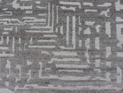 Modern Hand Knotted Wool Area Rug in Cream and Light Gray With Abstract Design Measures 5'8 x 8'5 This modern area rug was hand - knotted in during the 2020's. The field features a sub - geometric abstract design cover the entirety of the fa... - Keivan Woven ArtsIN - ILM - 172 - HW - 2330 - 21006