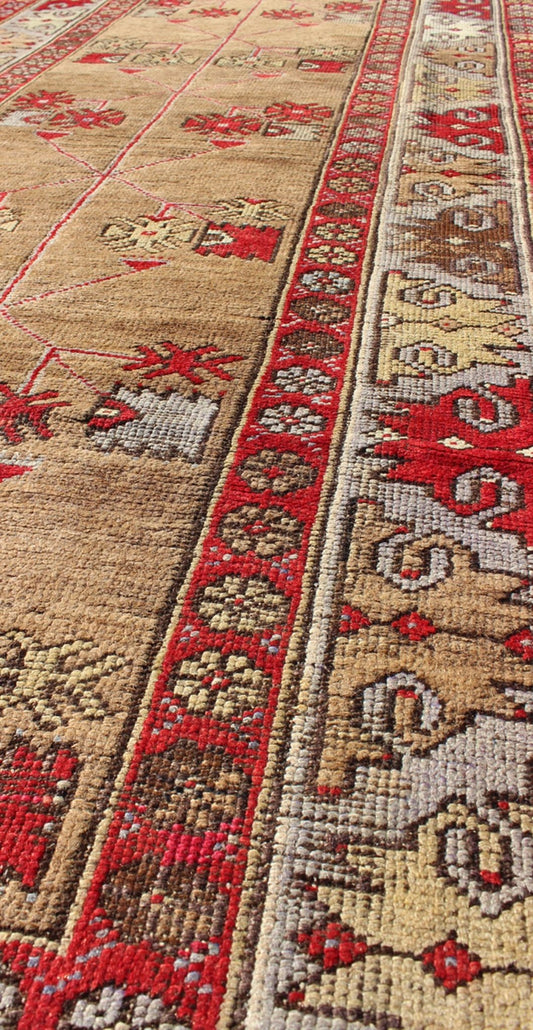 Tribal Design Antique Turkish Oushak Runner in Camel Background, Red & Gray. Multicolored antique Turkish Oushak runner with geometrics and flowers, Keivan Woven Arts / rug IS - 109, country of origin / type: Turkey / Oushak, circa 1920 Thi... - Keivan Woven ArtsIS - 109 - 2217Rug