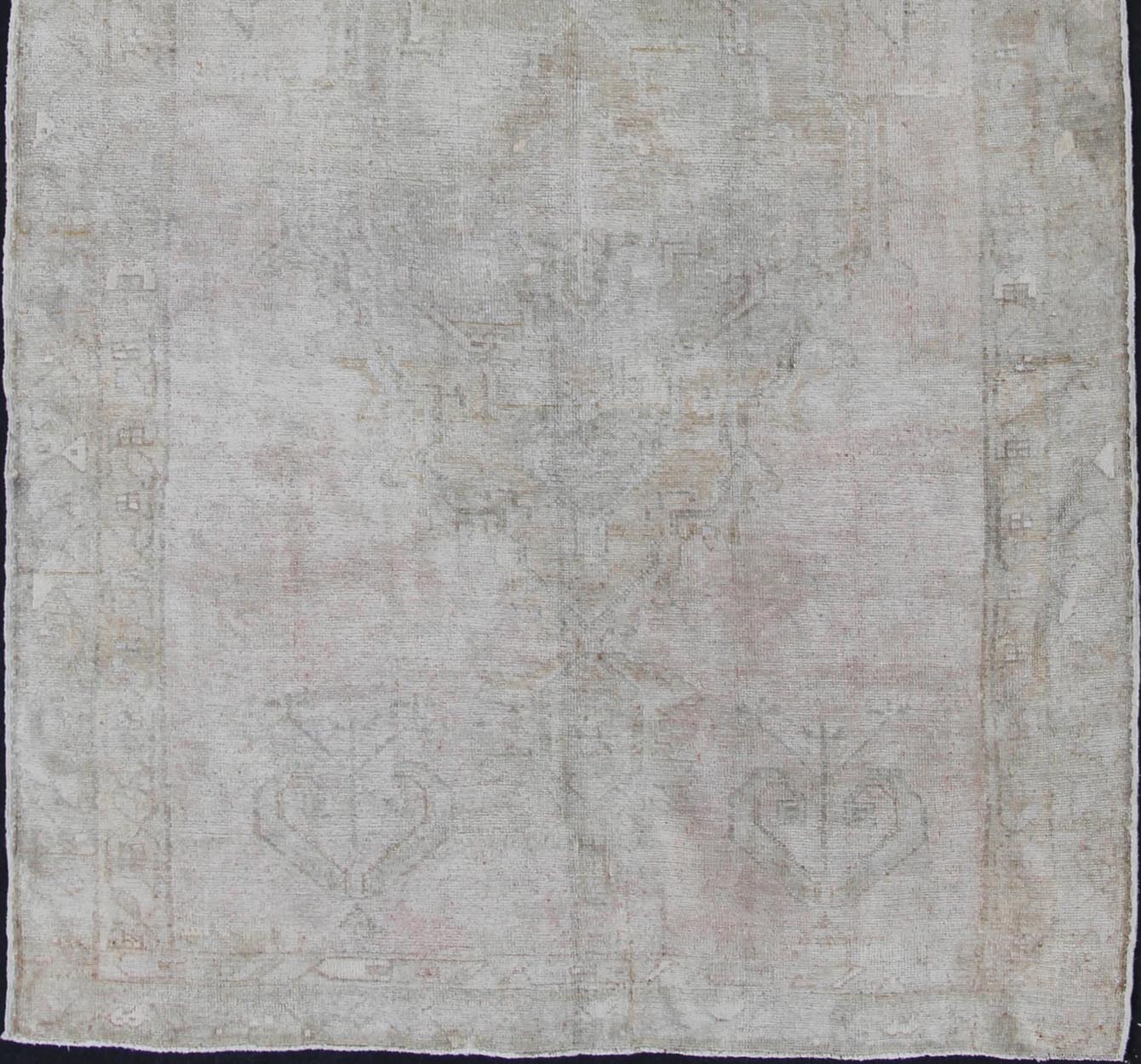 Oushak carpet antique from Turkey with subdued tones and design, rug IS - 110, country of origin / type: Turkey / Oushak, circa 1930 This long and beautiful antique Turkish Oushak rug possesses two stretched palmette medallions and an overall Sub - ... - Keivan Woven ArtsIS - 110 - 848Rug
