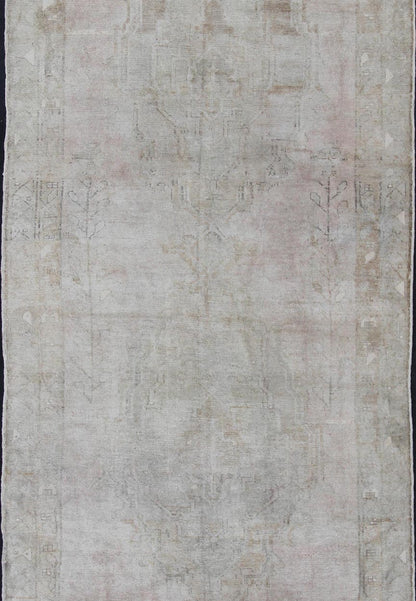Oushak carpet antique from Turkey with subdued tones and design, rug IS - 110, country of origin / type: Turkey / Oushak, circa 1930 This long and beautiful antique Turkish Oushak rug possesses two stretched palmette medallions and an overall Sub - ... - Keivan Woven ArtsIS - 110 - 848Rug