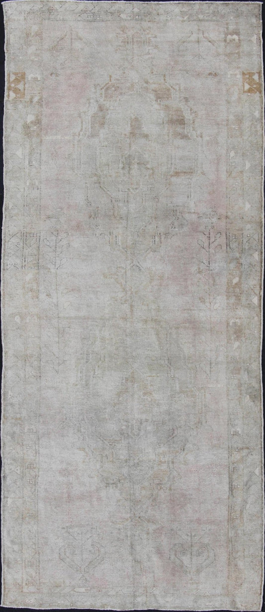 Oushak carpet antique from Turkey with subdued tones and design, rug IS - 110, country of origin / type: Turkey / Oushak, circa 1930 This long and beautiful antique Turkish Oushak rug possesses two stretched palmette medallions and an overall Sub - ... - Keivan Woven ArtsIS - 110 - 848Rug