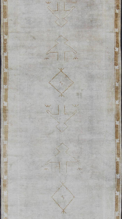 Midcentury vintage Turkish Oushak rug with tribal design in muted tones, rug is - 132, country of origin type: Turkey Oushak, circa mid - 20th century. This Turkish Oushak runner features a multi - medallion tribal design as well as patterns of smalle... - Keivan Woven ArtsIS - 132 - 1462Rug