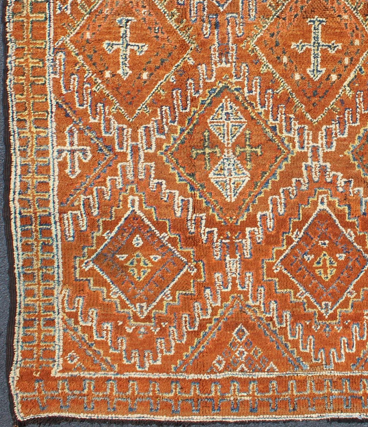Antique Moroccan Rug with Diamond & Geometric Design in Brown, red, Orange, Green This magnificent Moroccan carpet is somewhat rare due to its early age. The rug is constructed with a soft wool pile in a lusciously saturated brown hue. An overall ... - Keivan Woven ArtsJ10 - 0404 - 1887Rug