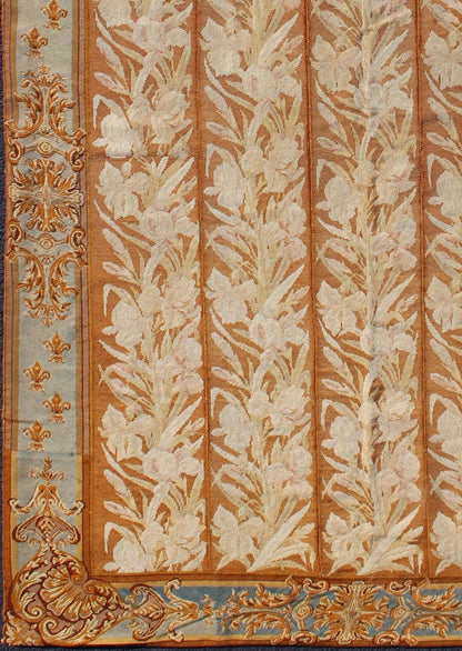 Antique Aubusson Tapestry with Golden Column Panels of Irises This exquisite antique Aubusson tapestry was delicately crafted in France around the middle of the 19th century during the reign of Louis Napoleon Bonaparte. The central body is compo... - Keivan Woven ArtsJ10 - 0801 - 2247Rug