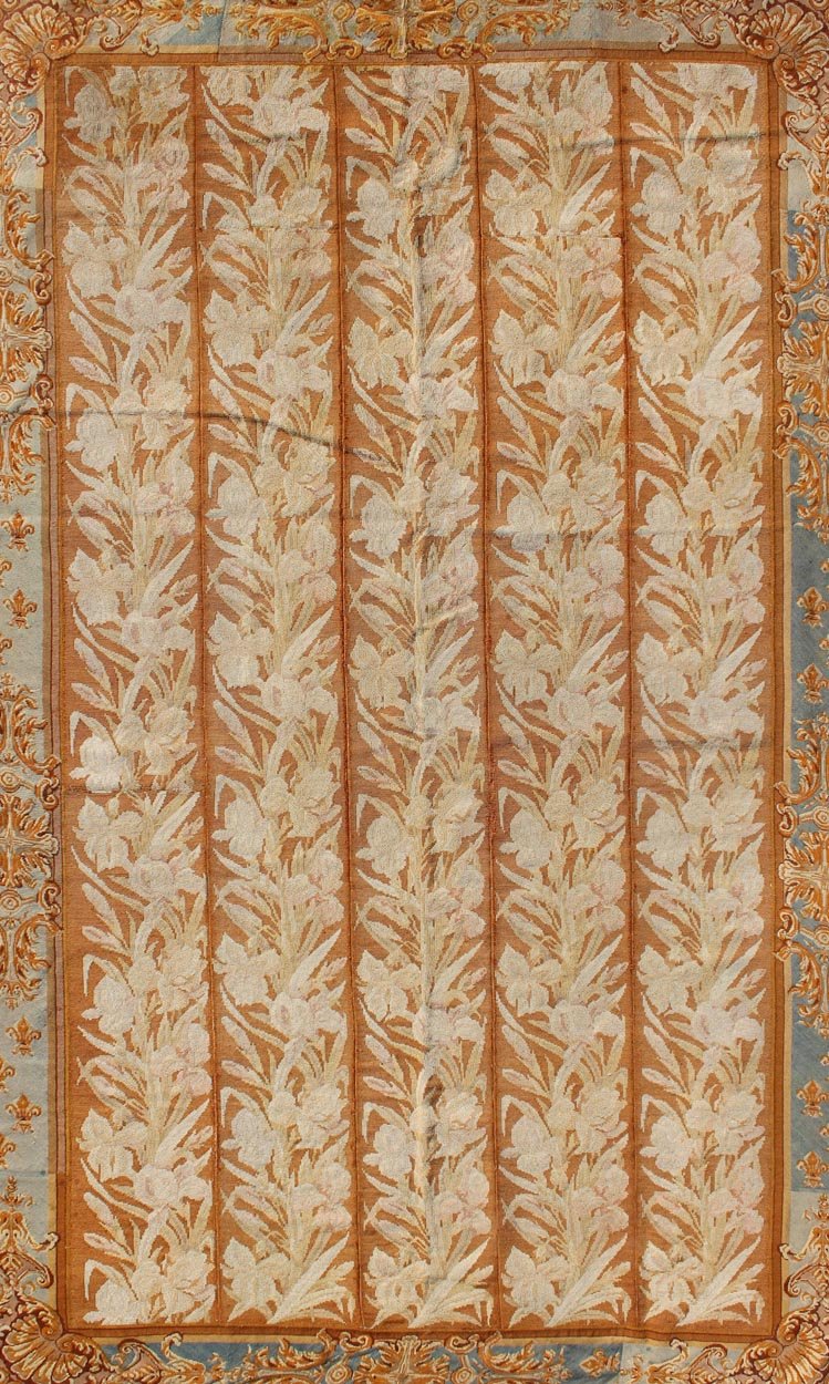 Antique Aubusson Tapestry with Golden Column Panels of Irises This exquisite antique Aubusson tapestry was delicately crafted in France around the middle of the 19th century during the reign of Louis Napoleon Bonaparte. The central body is compo... - Keivan Woven ArtsJ10 - 0801 - 2247Rug