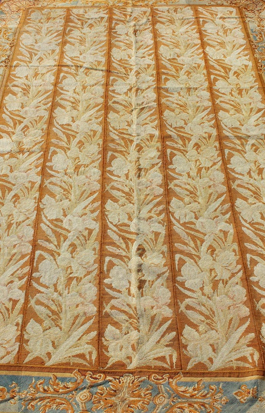 Antique Aubusson Tapestry with Golden Column Panels of Irises This exquisite antique Aubusson tapestry was delicately crafted in France around the middle of the 19th century during the reign of Louis Napoleon Bonaparte. The central body is compo... - Keivan Woven ArtsJ10 - 0801 - 2247Rug