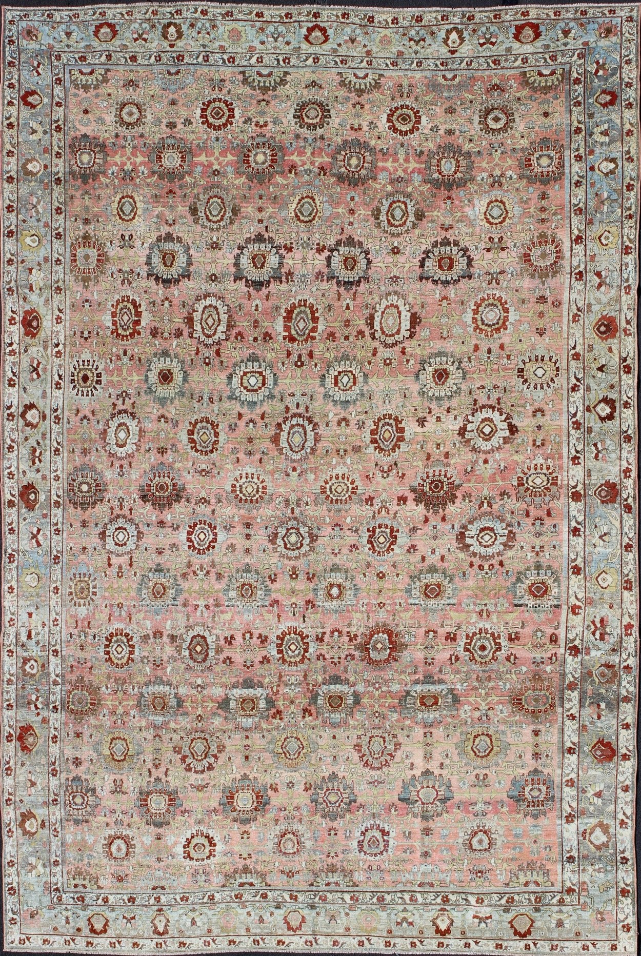 Remarkable antique Persian Bidjar rug with all - over design in light pink, light green and blue. kwarugs J10 - 0805. This magnificent Bidjar with an exquisite, all - over pattern and monumental size rests beautifully on a variegated pink colored backgro... - Keivan Woven ArtsJ10 - 0805 - 1975Rug
