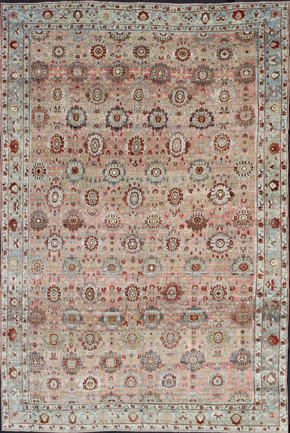 Remarkable antique Persian Bidjar rug with all - over design in light pink, light green and blue. kwarugs J10 - 0805. This magnificent Bidjar with an exquisite, all - over pattern and monumental size rests beautifully on a variegated pink colored backgro... - Keivan Woven ArtsJ10 - 0805 - 1975Rug