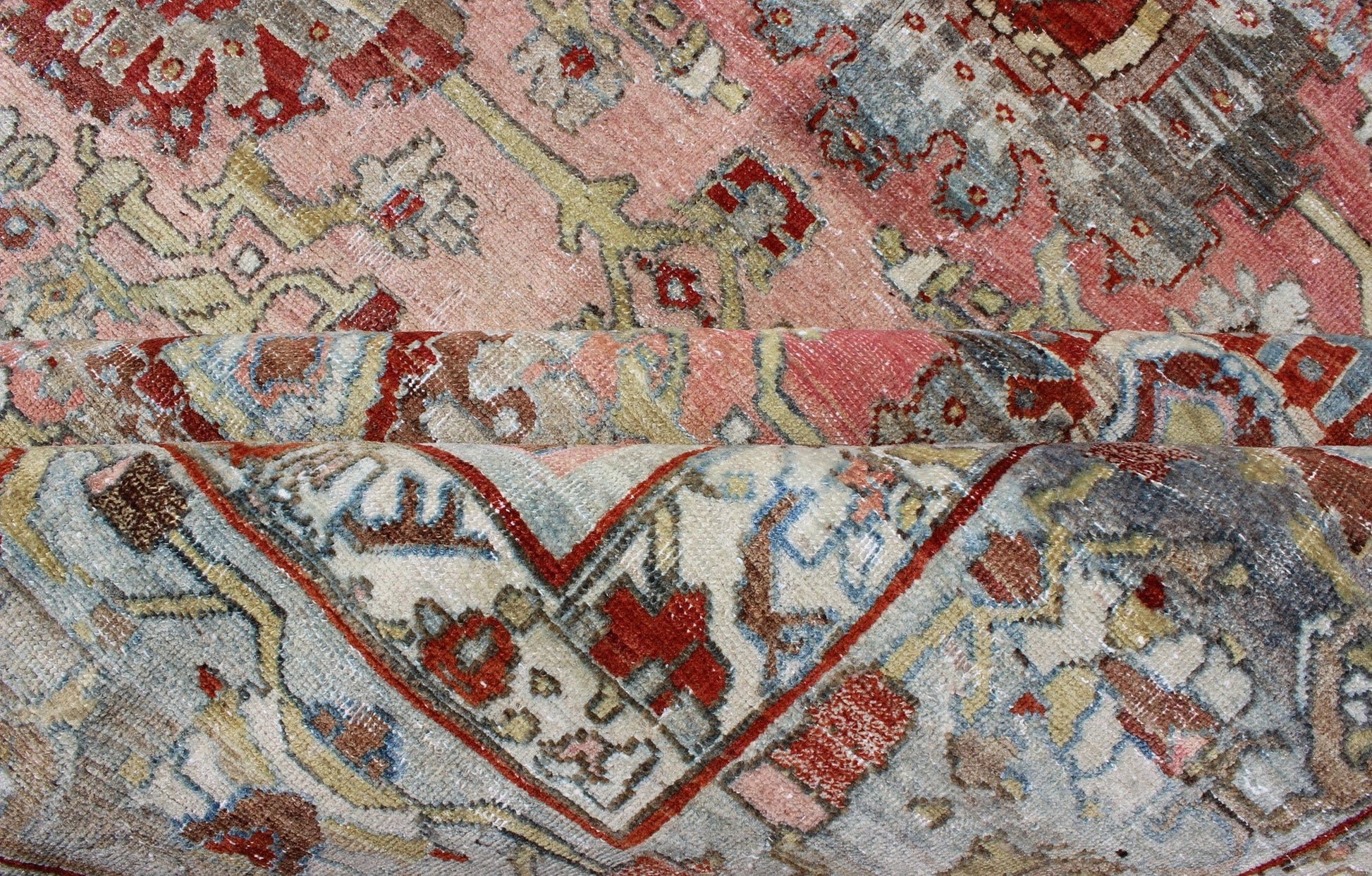 Remarkable antique Persian Bidjar rug with all - over design in light pink, light green and blue. kwarugs J10 - 0805. This magnificent Bidjar with an exquisite, all - over pattern and monumental size rests beautifully on a variegated pink colored backgro... - Keivan Woven ArtsJ10 - 0805 - 1975Rug