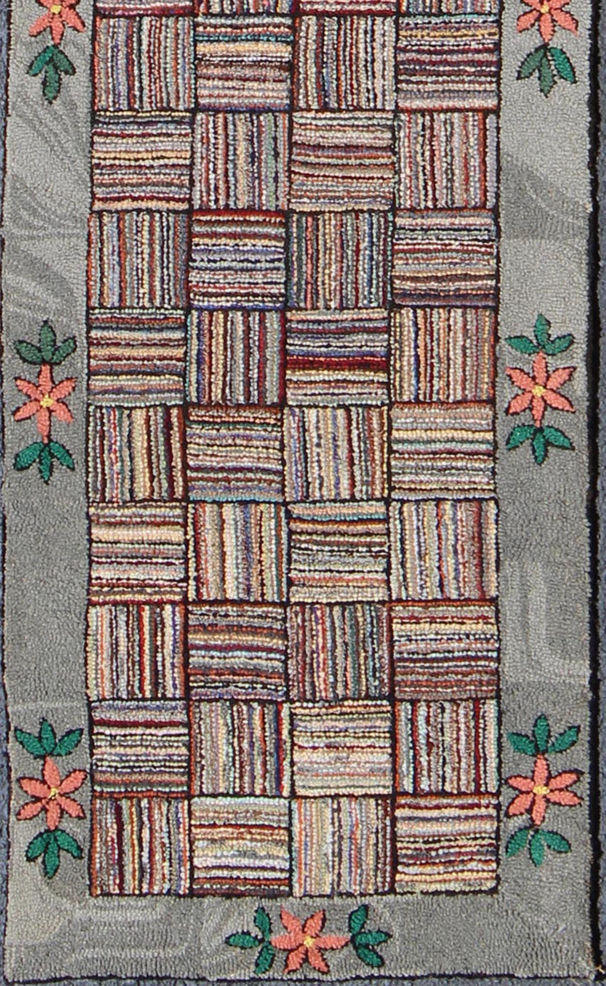 Antique American Hooked runner with colorful patchwork design, rug j10 - 1002, country of origin / type: United States / Hooked, circa 1920. This vintage American Hooked rug depicts a beautiful patchwork design in a variety of colors. The entirety... - Keivan Woven ArtsJ10 - 1002 - 2487Rug