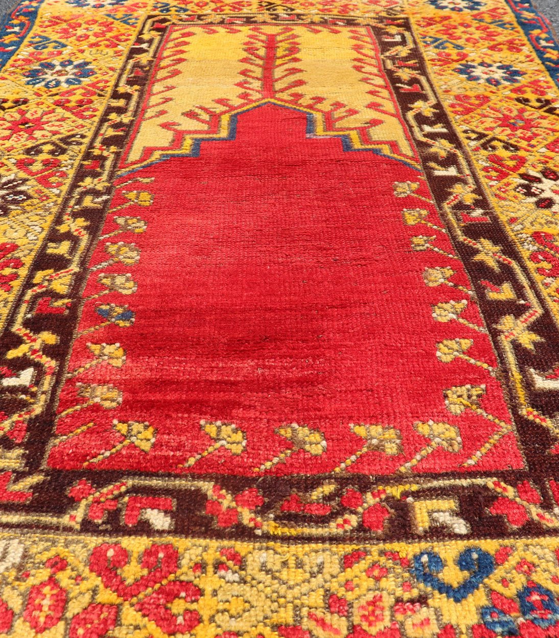 Antique Turkish Prayer Rug in Vibrant Saffron Yellow, Red and Blue. Keivan Woven Arts / rug J10 - 1010, country of origin / type: Turkey / Oushak, circa Early - 20th century Measures: 3'6 x 5'6. This antique prayer design rug from Konya region of Kir... - Keivan Woven ArtsJ10 - 1010 - 2501Rug