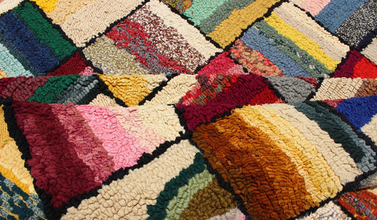 Vintage American Hook Rug This spectacular vintage American hook rug visually vibrates with a stunning myriad of colors and striped, checker - patterned weaves. The repeat patterned squares are outlined in a thin border of black and contain a vast... - Keivan Woven ArtsJ10 - 1013 - 2507Rug