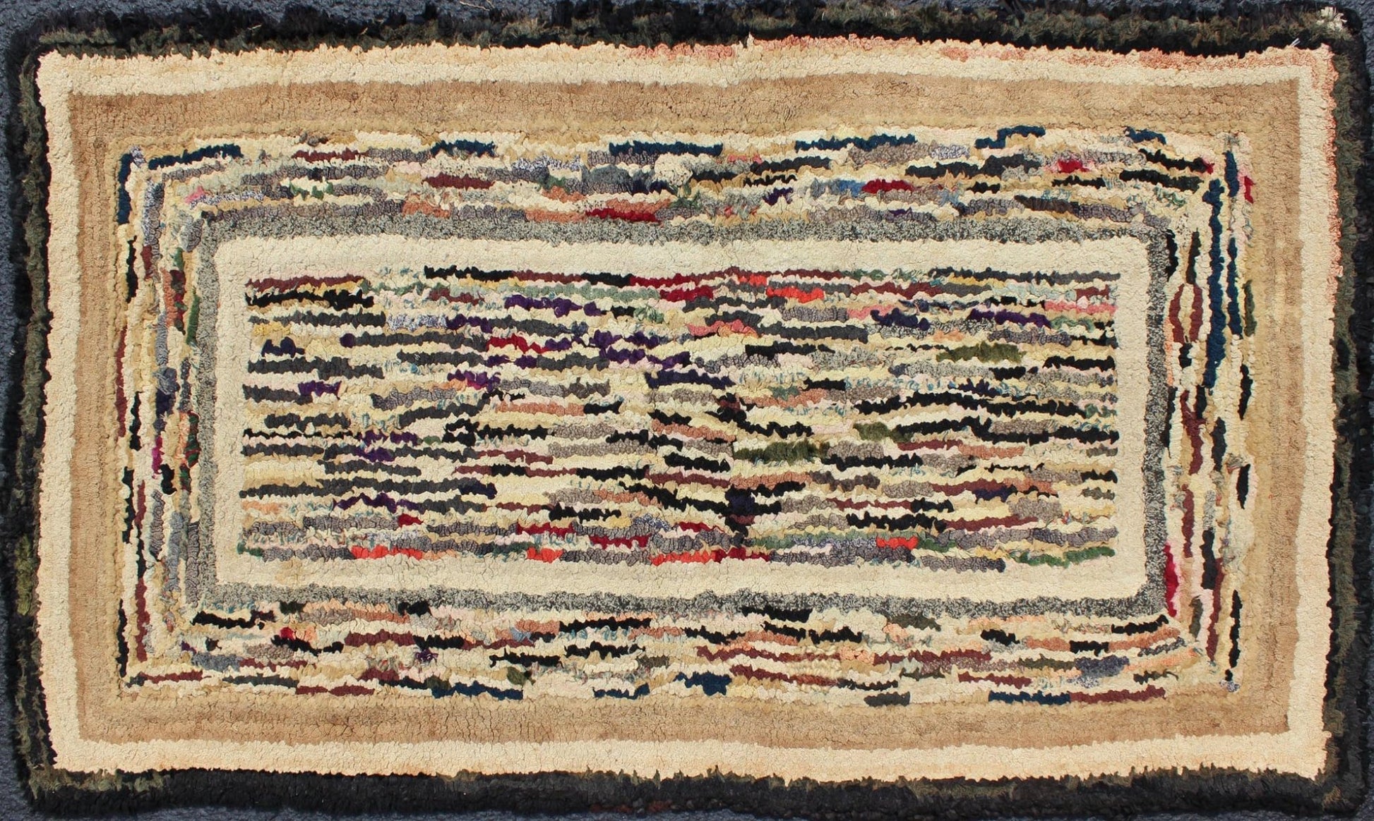 American Hooked Rug with Variegated Design in Black, Brown and Taupe Antique hooked rug with variegated design, Keivan Woven Arts , rug J10 - 1017, country of origin / type: United States / Hooked, circa 1920. This antique rug features a va... - Keivan Woven ArtsJ10 - 1017 - 2515Rug