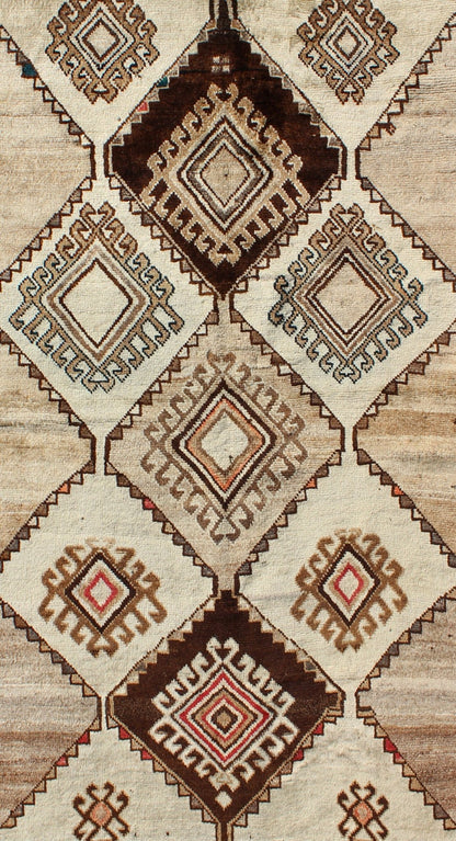 Vintage Persian Gabbeh with Diamond and Geometric design in Earth tones. rug J10 - 1021, country of origin / type: Iran / Gabbeh, circa 1940 This high - pile excellent condition Persian Gabbeh from Southern Iran consists of large scale repeating, di... - Keivan Woven ArtsJ10 - 1021 - 2233Rug