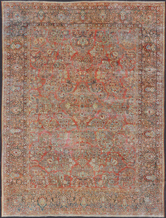 Antique Persian Sarouk withall - over floral design on a light red field. Keivan Woven Arts / J10 - 1101, country of origin / type: Iran / Sarouk circa 1920 Measures: 10'2 x 13'3 This wonderful early 20th century Persian Sarouk carpet features a mas... - Keivan Woven ArtsJ10 - 1101 - 2237Rug