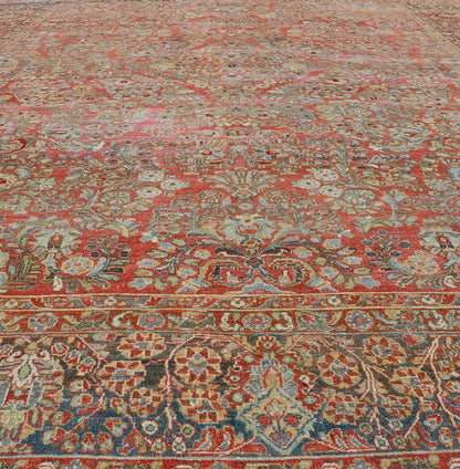 Antique Persian Sarouk withall - over floral design on a light red field. Keivan Woven Arts / J10 - 1101, country of origin / type: Iran / Sarouk circa 1920 Measures: 10'2 x 13'3 This wonderful early 20th century Persian Sarouk carpet features a mas... - Keivan Woven ArtsJ10 - 1101 - 2237Rug