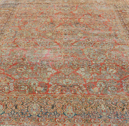 Antique Persian Sarouk withall - over floral design on a light red field. Keivan Woven Arts / J10 - 1101, country of origin / type: Iran / Sarouk circa 1920 Measures: 10'2 x 13'3 This wonderful early 20th century Persian Sarouk carpet features a mas... - Keivan Woven ArtsJ10 - 1101 - 2237Rug