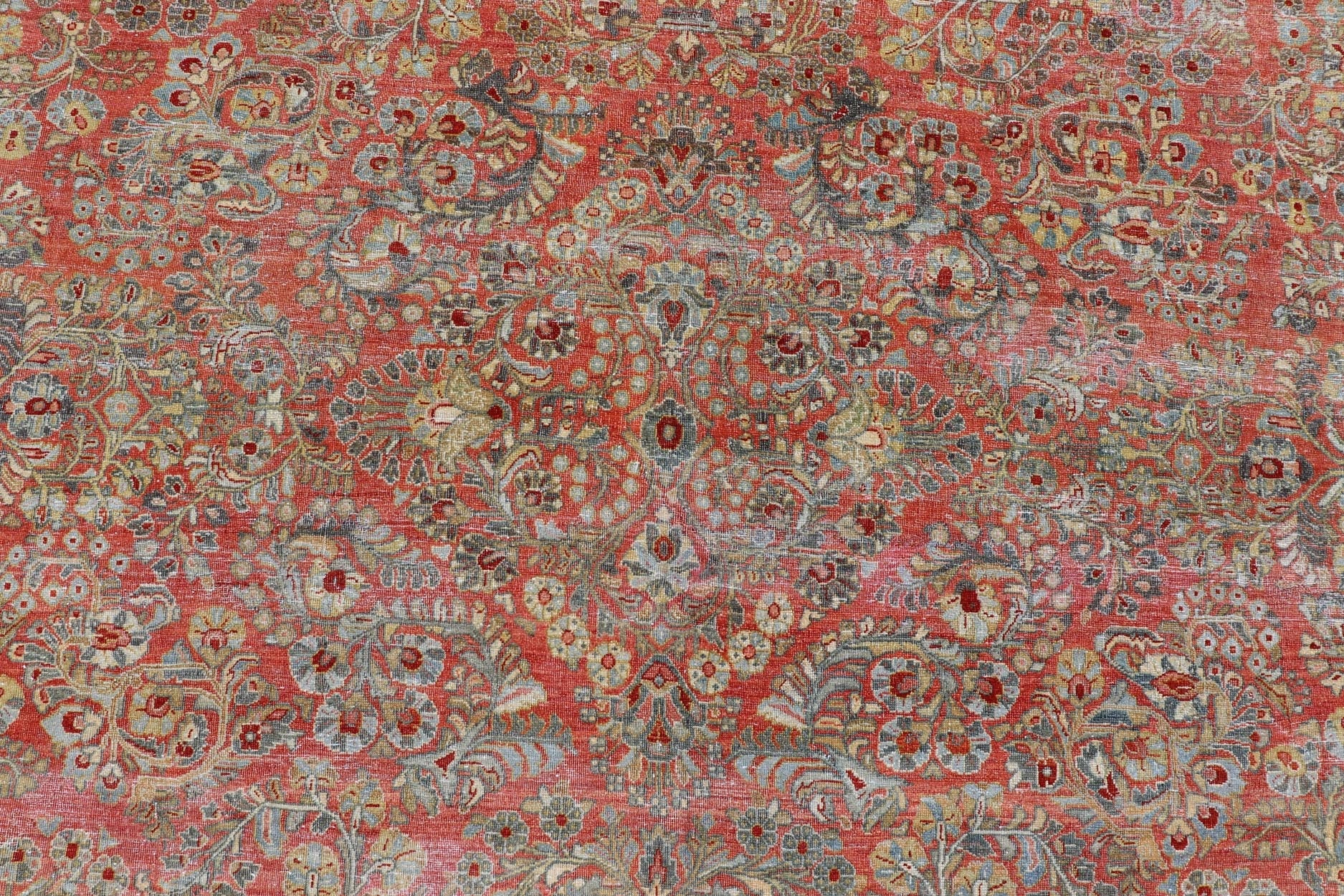 Antique Persian Sarouk withall - over floral design on a light red field. Keivan Woven Arts / J10 - 1101, country of origin / type: Iran / Sarouk circa 1920 Measures: 10'2 x 13'3 This wonderful early 20th century Persian Sarouk carpet features a mas... - Keivan Woven ArtsJ10 - 1101 - 2237Rug