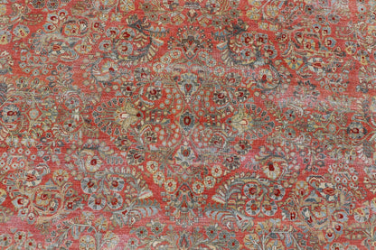 Antique Persian Sarouk withall - over floral design on a light red field. Keivan Woven Arts / J10 - 1101, country of origin / type: Iran / Sarouk circa 1920 Measures: 10'2 x 13'3 This wonderful early 20th century Persian Sarouk carpet features a mas... - Keivan Woven ArtsJ10 - 1101 - 2237Rug