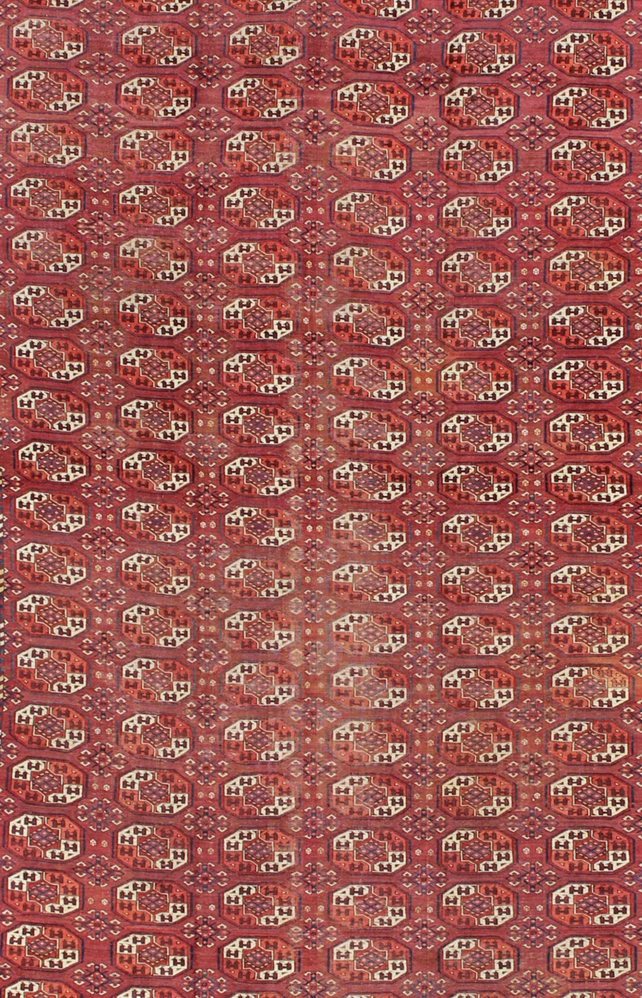Extremely Large Antique Gallery Rug with Red Field and Repeating Medallion Design. kwarugs J10 - 1105. Long Tekke gallery size. This rare antique Tekke carpet displays warm and delightful red. The field consists motifs with red, orange, medium blu... - Keivan Woven ArtsJ10 - 1105 - 2281Rug