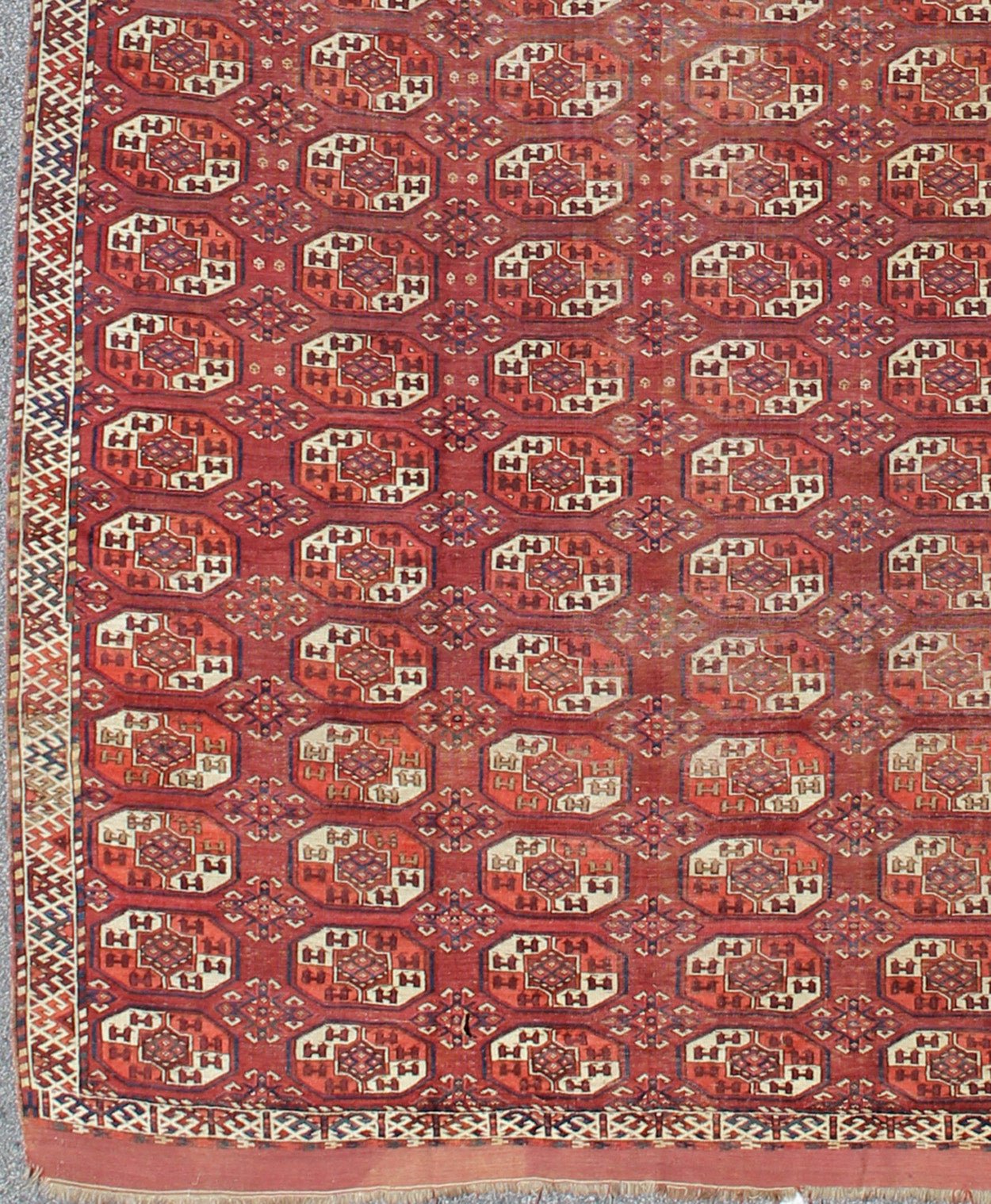 Extremely Large Antique Gallery Rug with Red Field and Repeating Medallion Design. kwarugs J10 - 1105. Long Tekke gallery size. This rare antique Tekke carpet displays warm and delightful red. The field consists motifs with red, orange, medium blu... - Keivan Woven ArtsJ10 - 1105 - 2281Rug