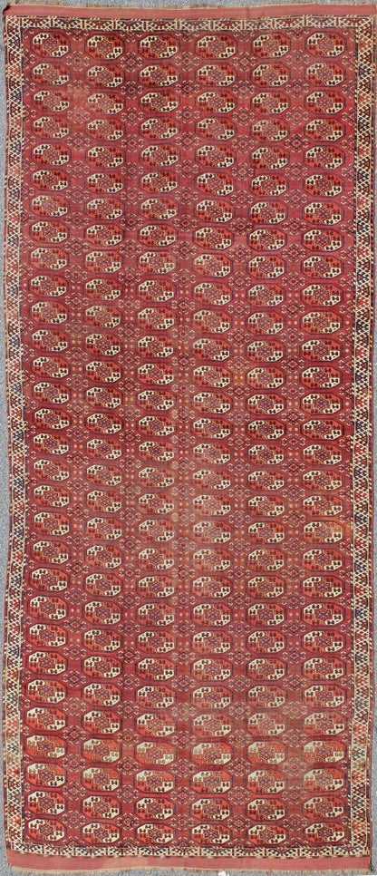 Extremely Large Antique Gallery Rug with Red Field and Repeating Medallion Design. kwarugs J10 - 1105. Long Tekke gallery size. This rare antique Tekke carpet displays warm and delightful red. The field consists motifs with red, orange, medium blu... - Keivan Woven ArtsJ10 - 1105 - 2281Rug