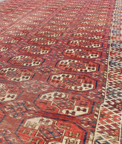 Extremely Large Antique Gallery Rug with Red Field and Repeating Medallion Design. kwarugs J10 - 1105. Long Tekke gallery size. This rare antique Tekke carpet displays warm and delightful red. The field consists motifs with red, orange, medium blu... - Keivan Woven ArtsJ10 - 1105 - 2281Rug