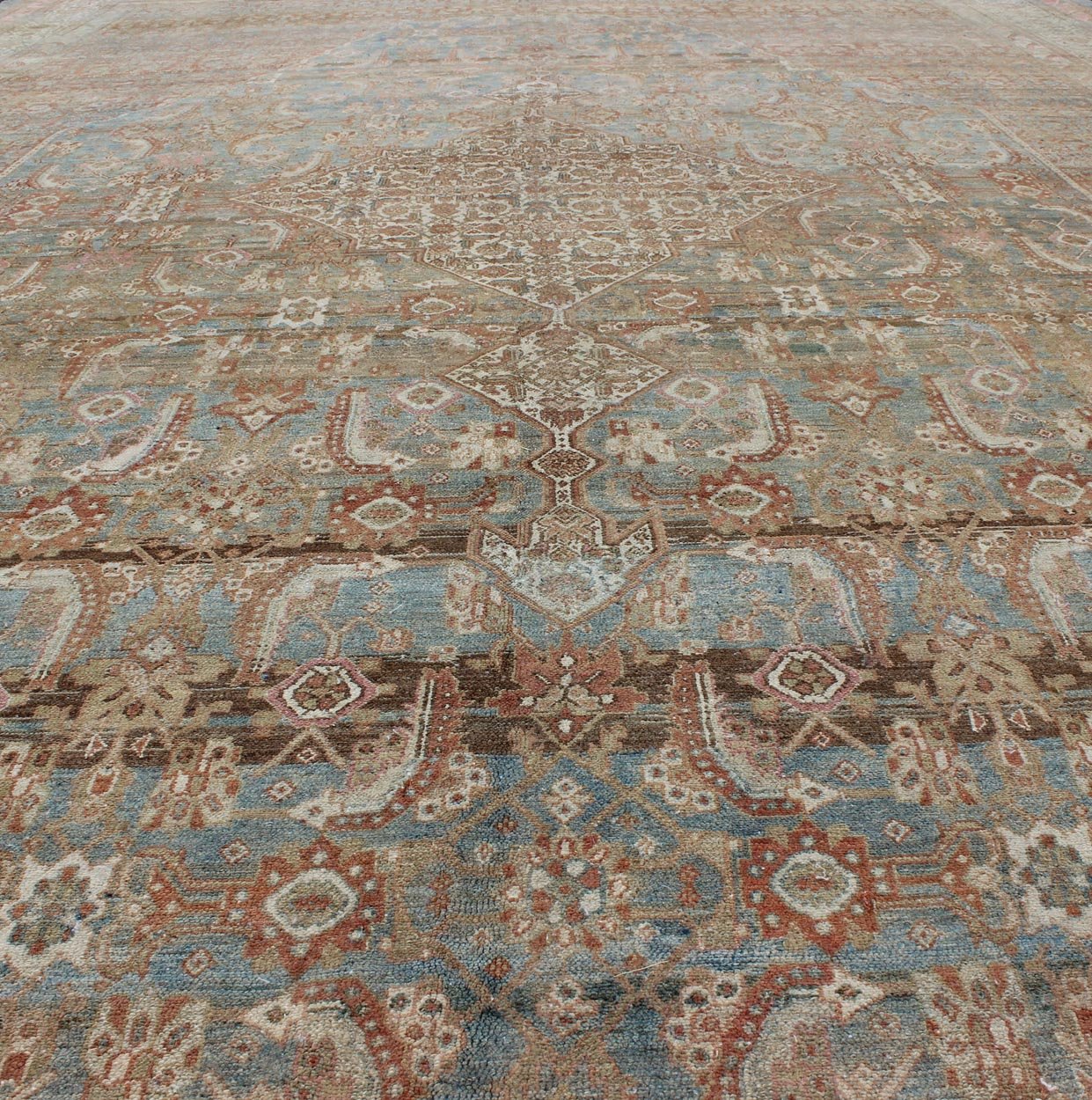 Early 20th century antique Persian Bibikabad Hamadan rug in light blue background, brown, salmon, cream, taupe and charcoal. Early 20th century antique Persian Bibikabad rug with large Medallion and Herati motifs throughout the rug, rug kb - 180701, ... - Keivan Woven ArtsKB - 180701 - 339Rug