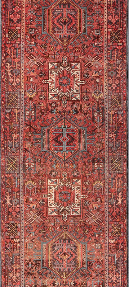 Wide Geometric Persian Heriz Runner with Medallions in Red & Jewel Tones Keivan Woven Arts - Geometric Medallion design multicolored vintage Persian Karadjeh runner, rug KB - H - 604 - 16, country of origin / type: Iran / Karadjeh, circa 1950. This... - Keivan Woven ArtsKB - H - 604 - 16 - 1334Rug