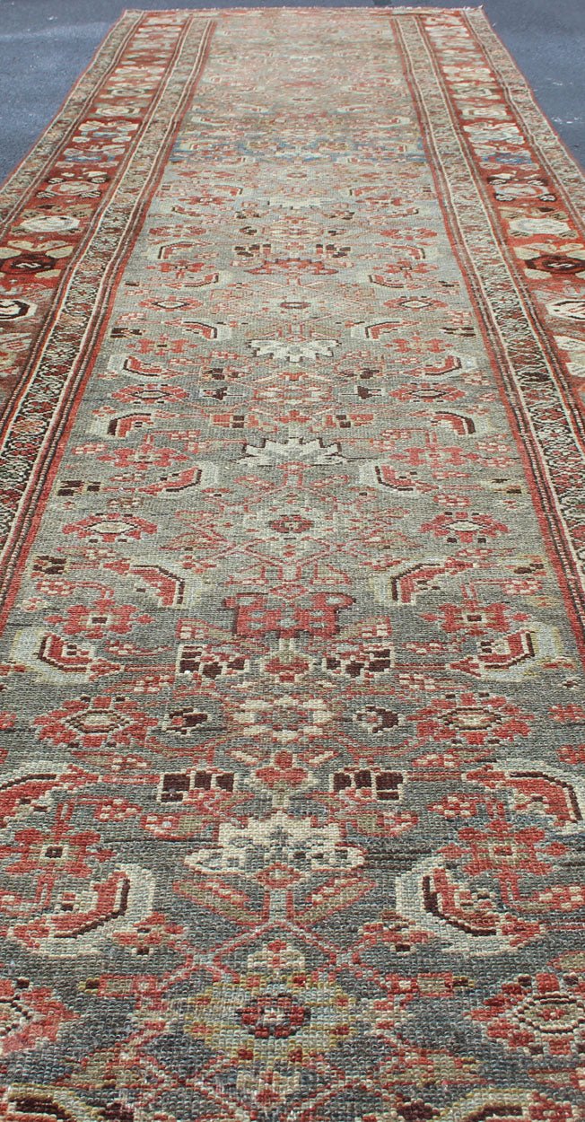 Sub - Geometric all over Herati Tribal Design Antique Persian Kurdish Runner in Multi colors variation of light colors Gray, green, blue background and soft red - colored border Persian Kurdish antique runner in Tribal all over Herati design with ge... - Keivan Woven ArtsKBE - 200203 - 12643Rug