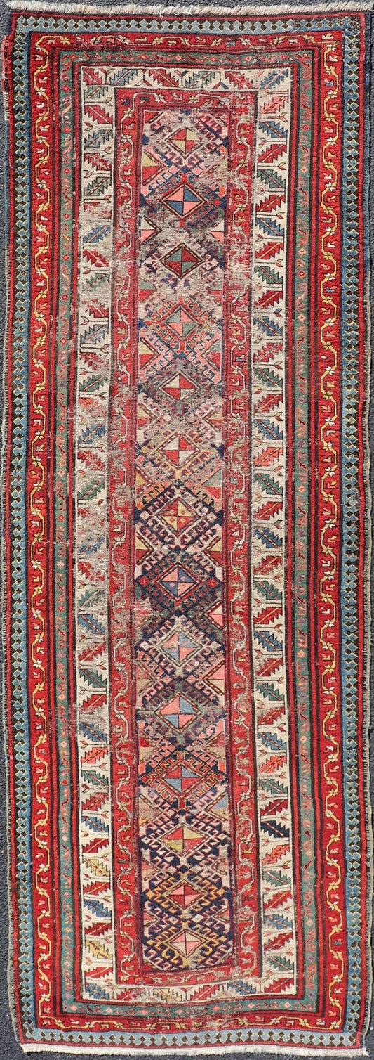 Distressed Medallion Antique Caucasian Kazak Rug with Geometric Medallions Distressed Geometric Medallion antique Caucasian Kazak rug in lighter tones. Keivan Woven Arts / rug KBE - 220101, country of origin / type: Iran / Caucasian Kazak, circa 1... - Keivan Woven ArtsKBE - 220101 - 19088
